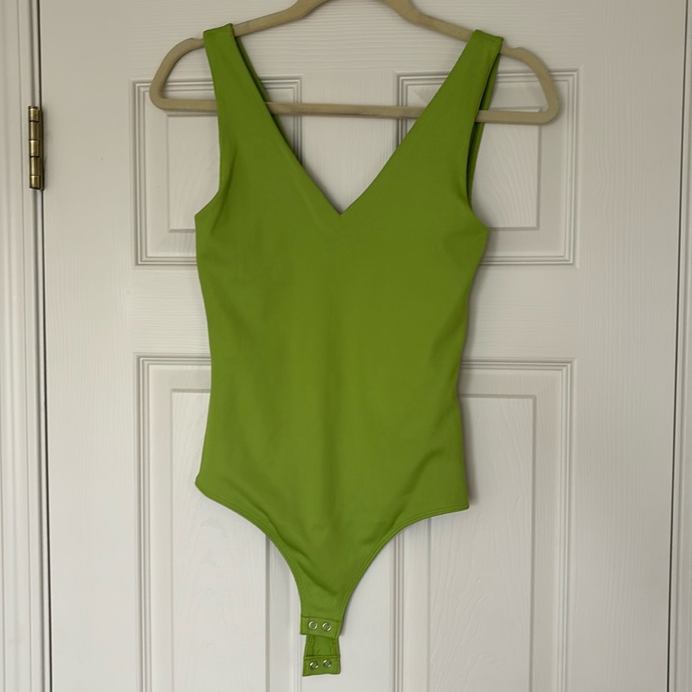 NWT Express size small V-neck bodysuit.